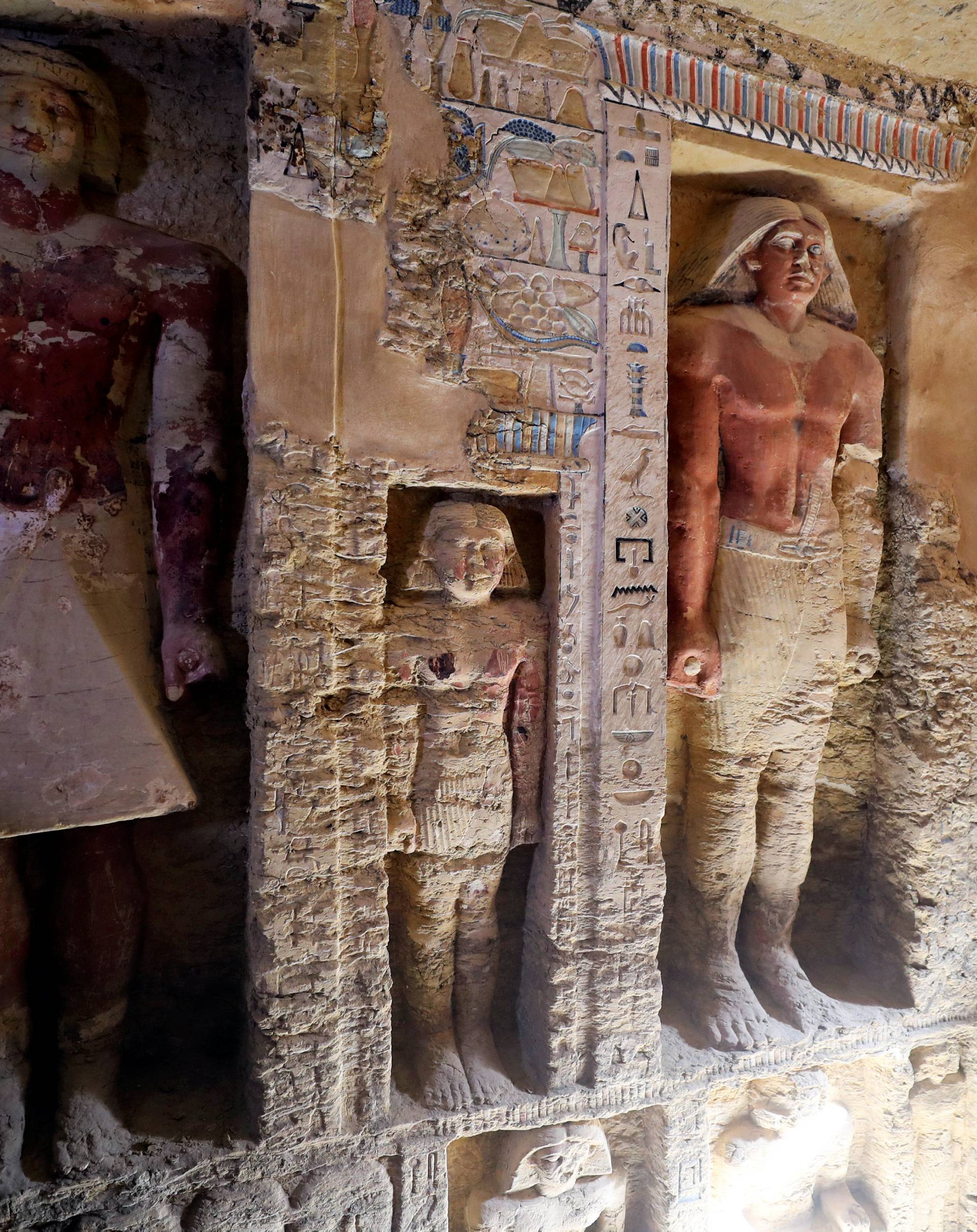 A view of statues inside the newly-discovered tomb of 'Wahtye', which dates from the rule of King Neferirkare Kakai, at the Saqqara area near its necropolis, in Giza