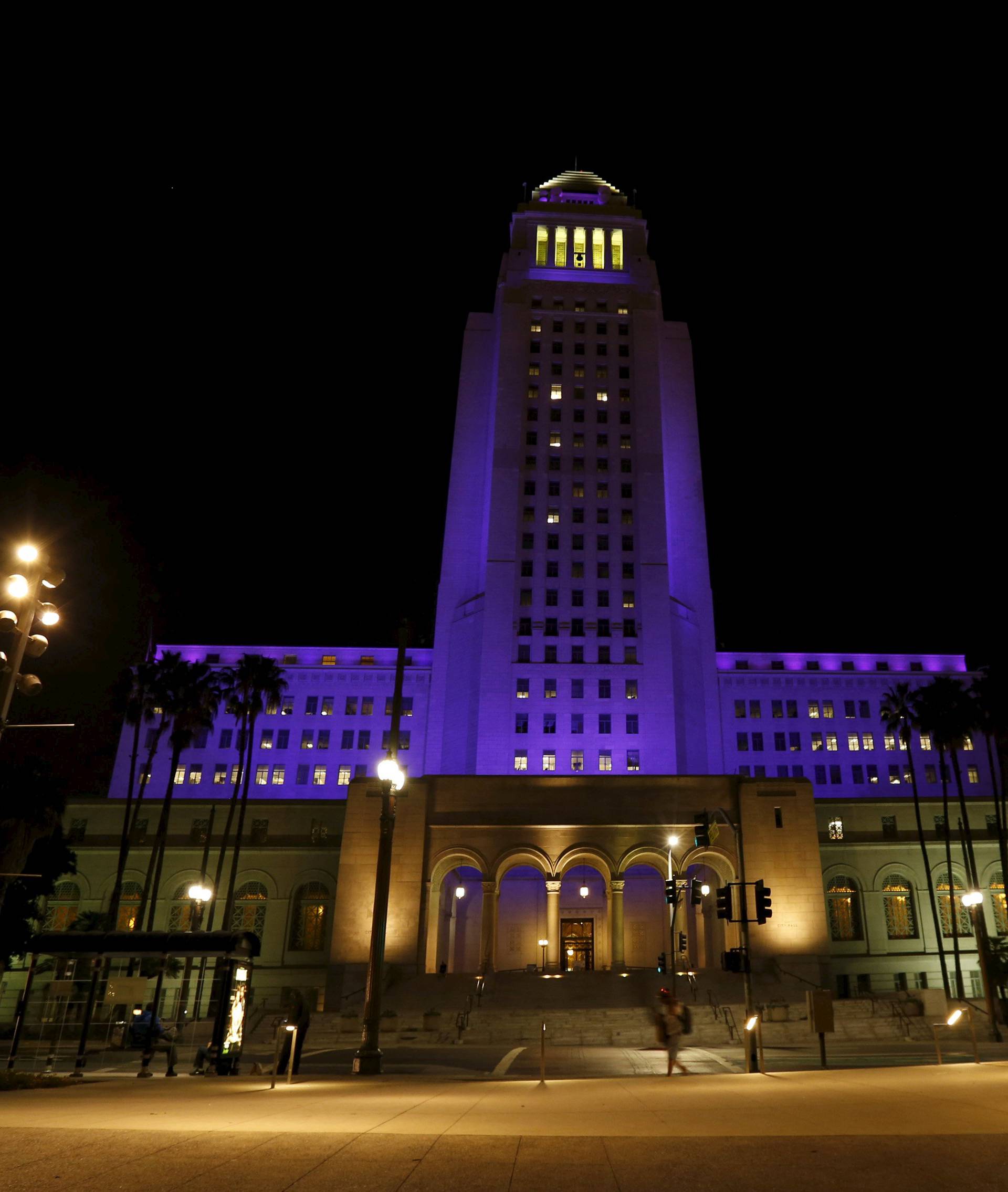 City Hall is illuminated in purple in remembrance of the late singer Prince in Downtown Los Angeles