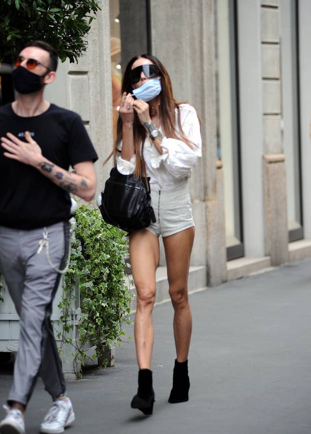 Milan, Nina Moric shopping downtown with friend