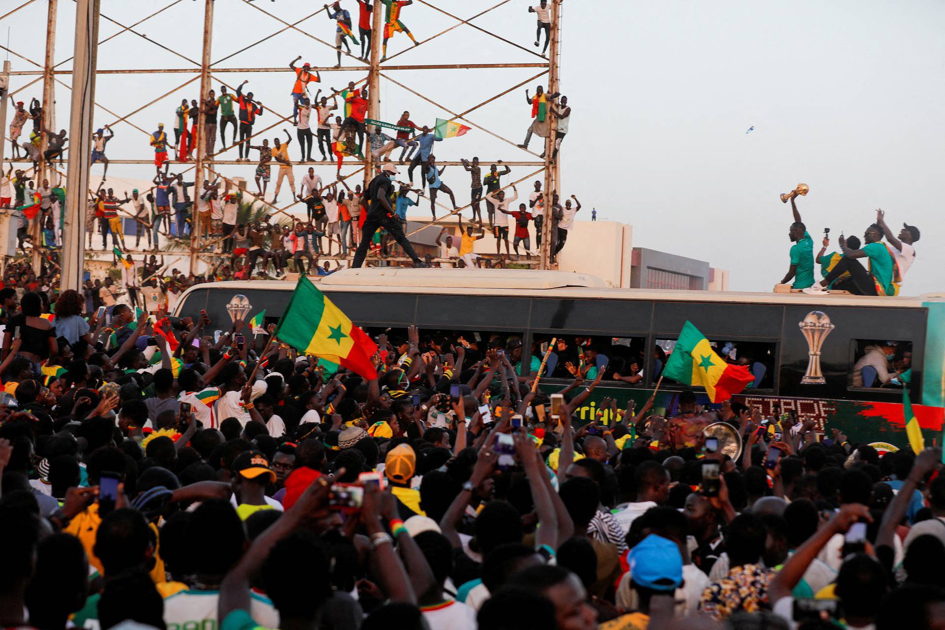 FILE PHOTO: Senegal fans celebrate and welcome the Senegal National Soccer Team after their Africa Cup win, in Dakar