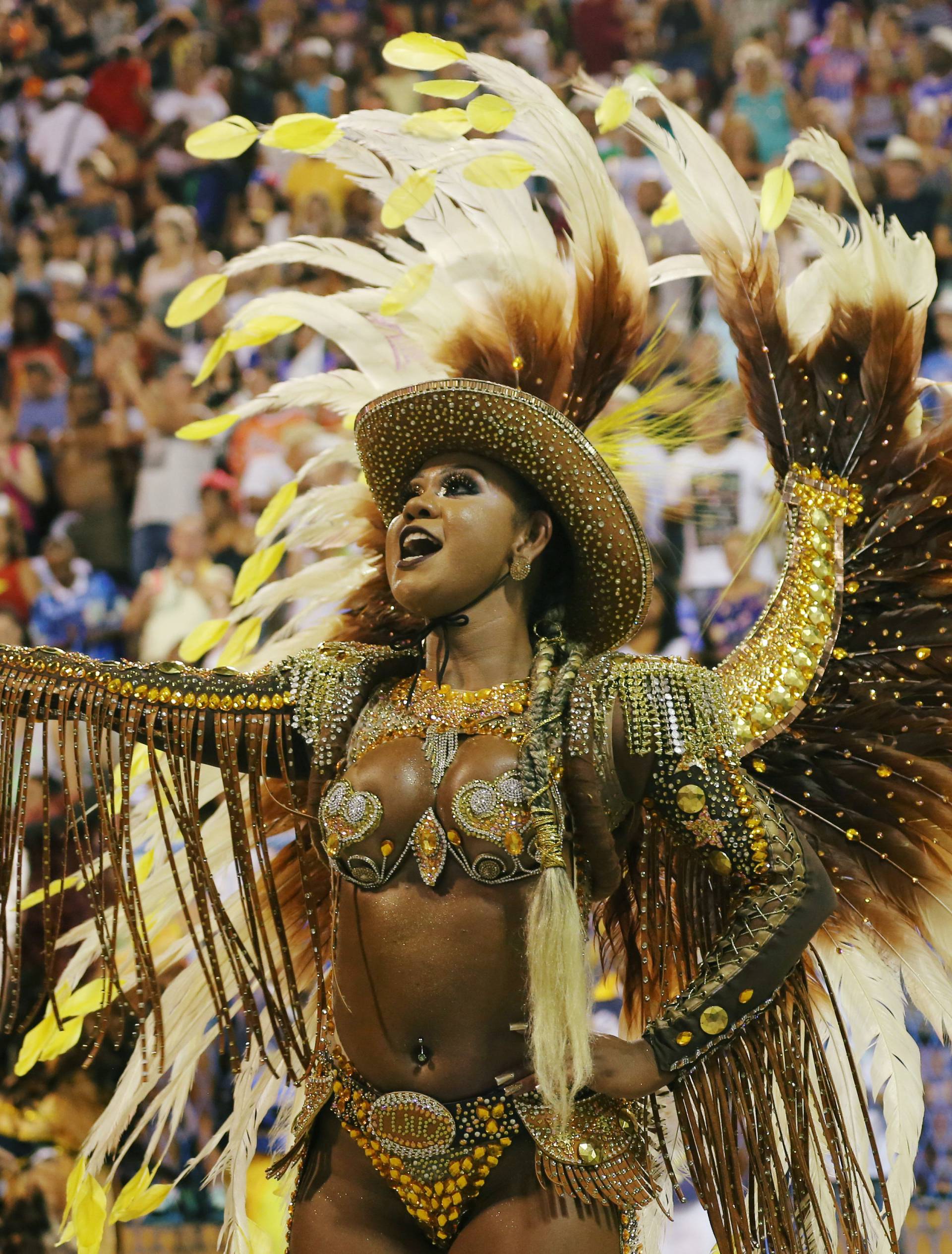 A reveller from Unidos da Tijuca Samba school performs during the second night of the Carnival parade at the Sambadrome in Rio de Janeiro