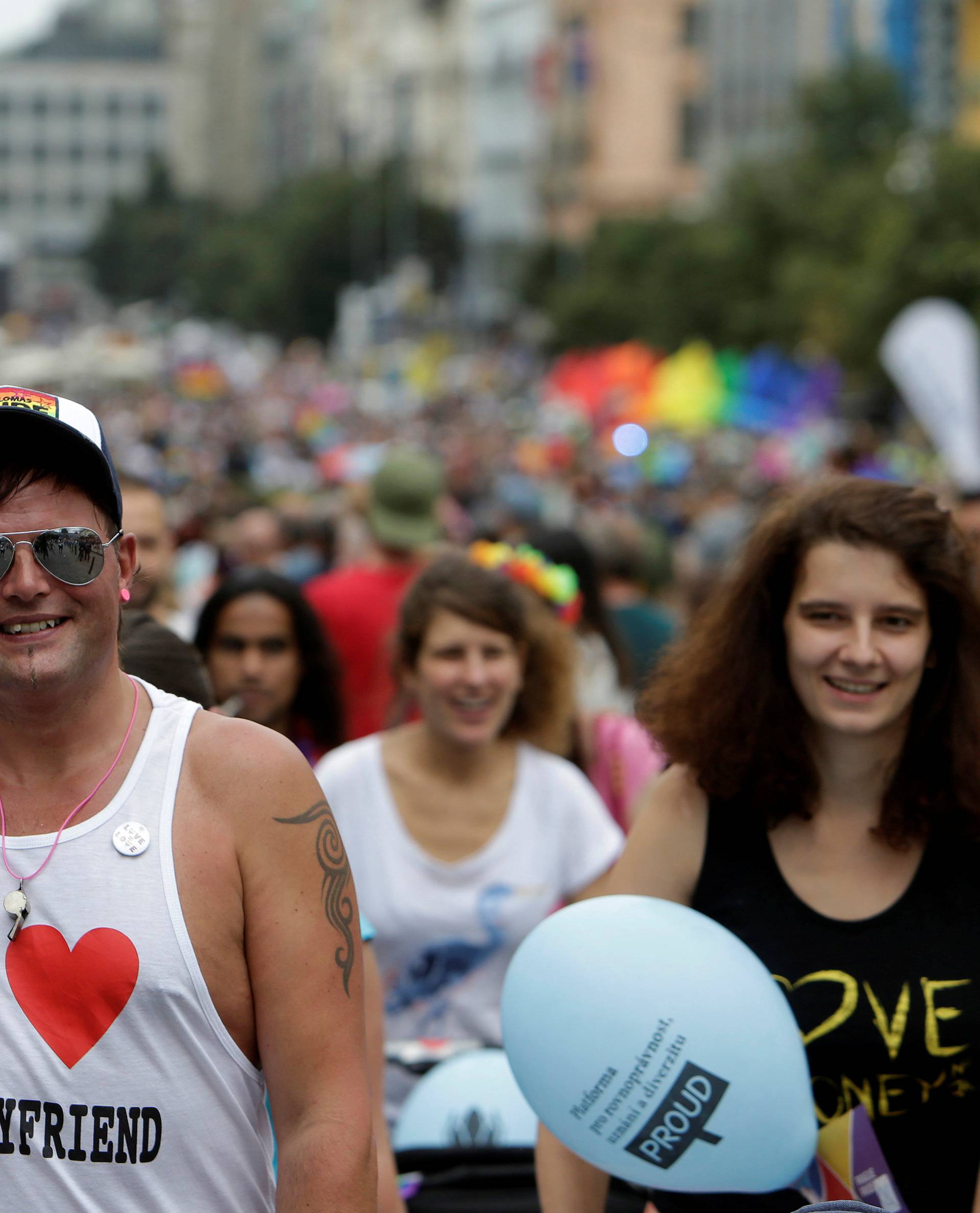 Participants attend the Prague Pride Parade where thousands marched through the city centre in support of gay rights, in Czech Republic