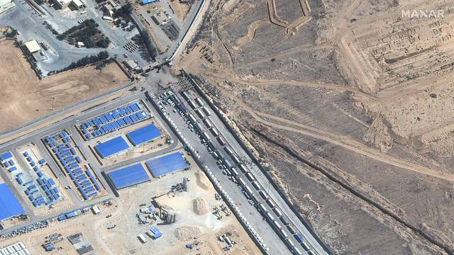 A satellite image shows a closer view of aid trucks waiting on Egyptian side of Rafah border crossing