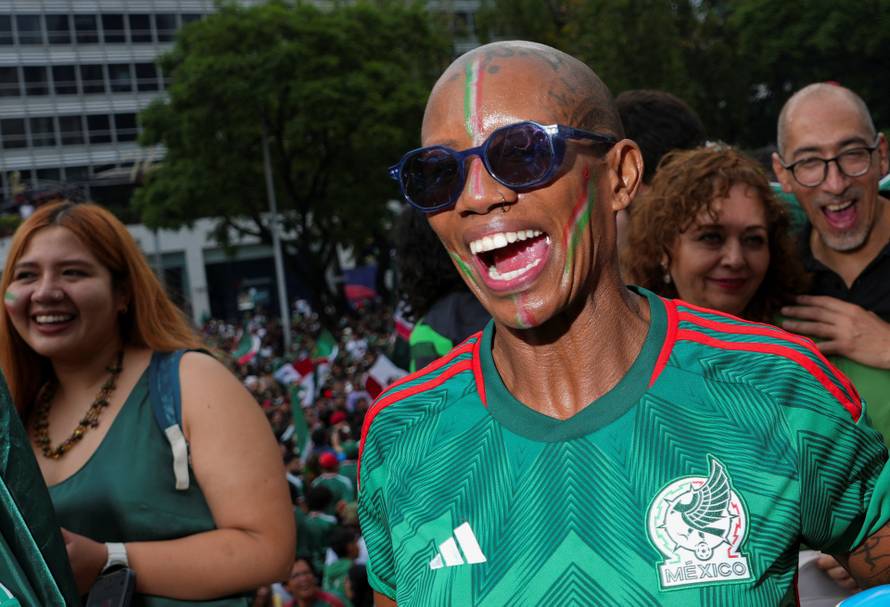 People celebrate Mexico's victory in the opening match of the 2026 FIFA World Cup, in Mexico City