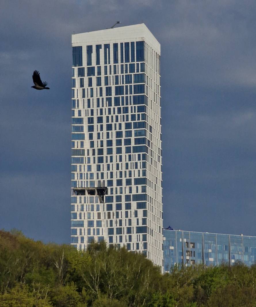 The damaged facade of a high-rise building following a drone attack, amid the Russia-Ukraine conflict, in Moscow