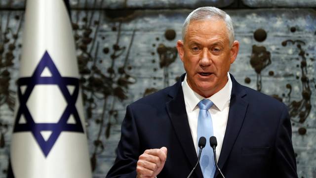 Benny Gantz, leader of Blue and White party, speaks during a nomination ceremony at the President's residency in Jerusalem