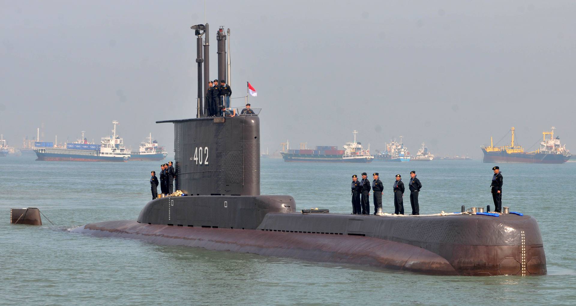 Indonesian Navy personnel are seen on the submarine KRI Nanggala-402 as they arrive in Surabaya