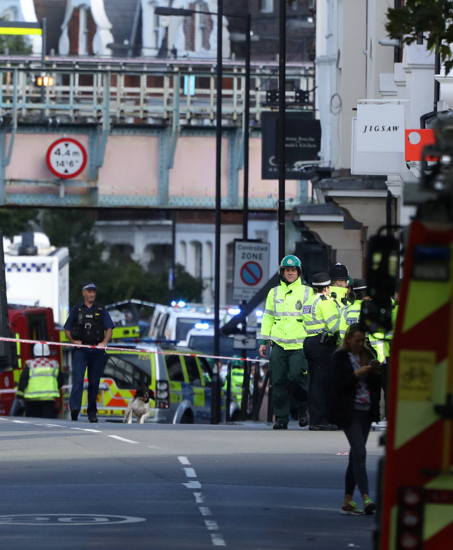 Police, fire and ambulance crew attend to an incident at Parsons Green underground station in London