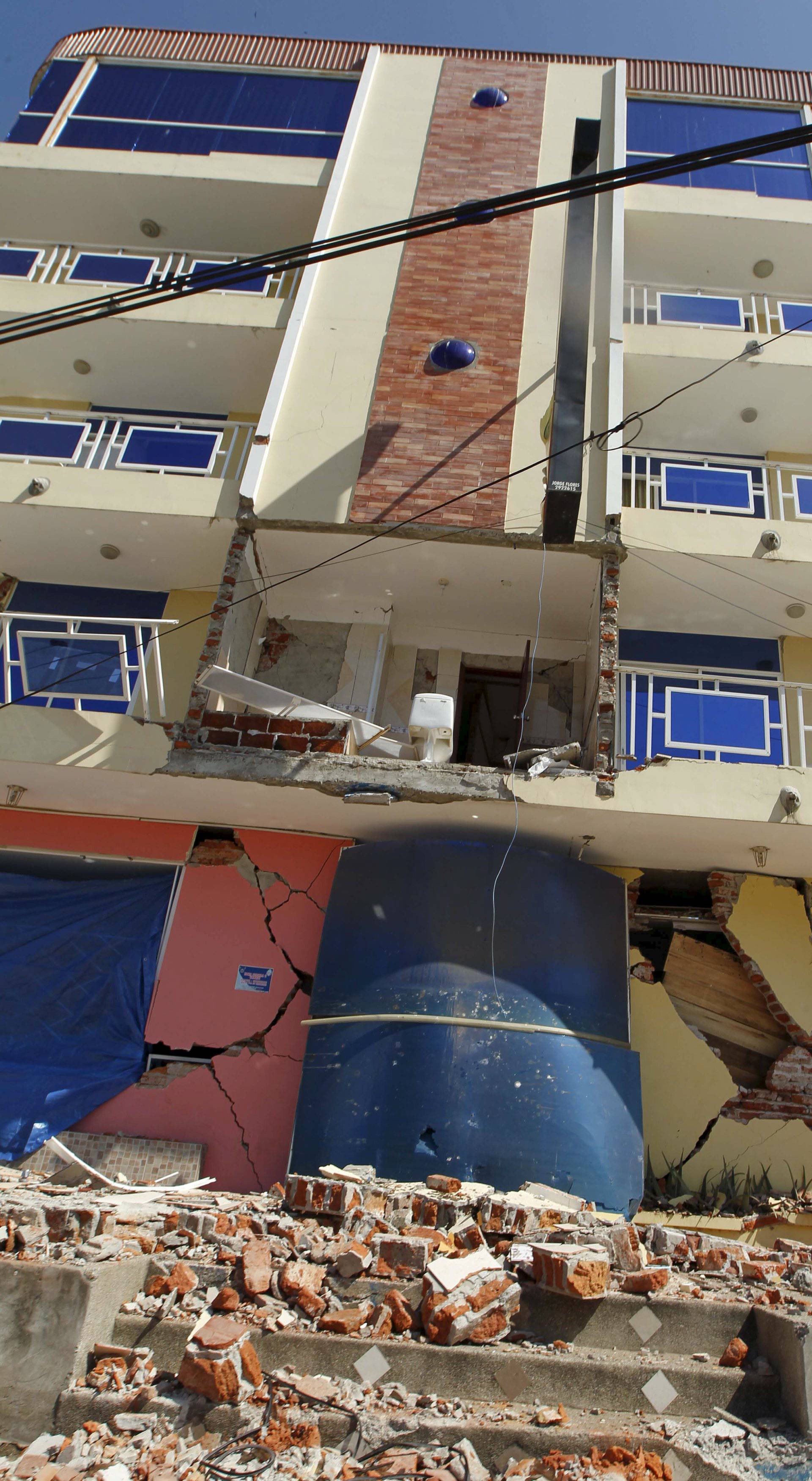 Damages and debris on the streets after an earthquake struck off Ecuador's Pacific coast, in Manta