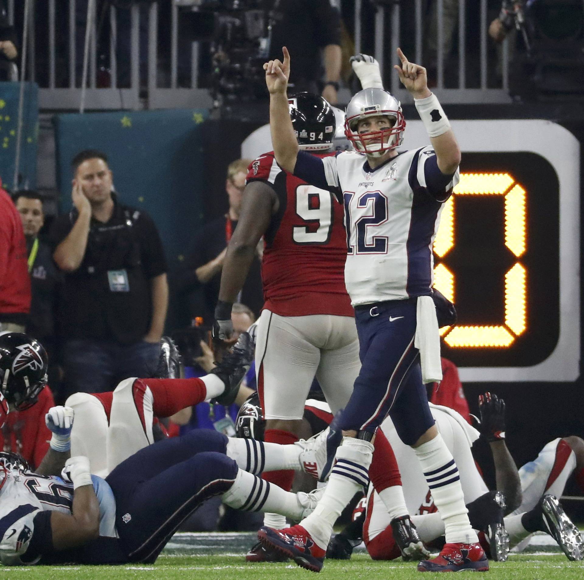 New England Patriots' quarterback Brady celebrates after James White scored a touchdown in the fourth quarter against the Atlanta Falcons at Super Bowl LI in Houston