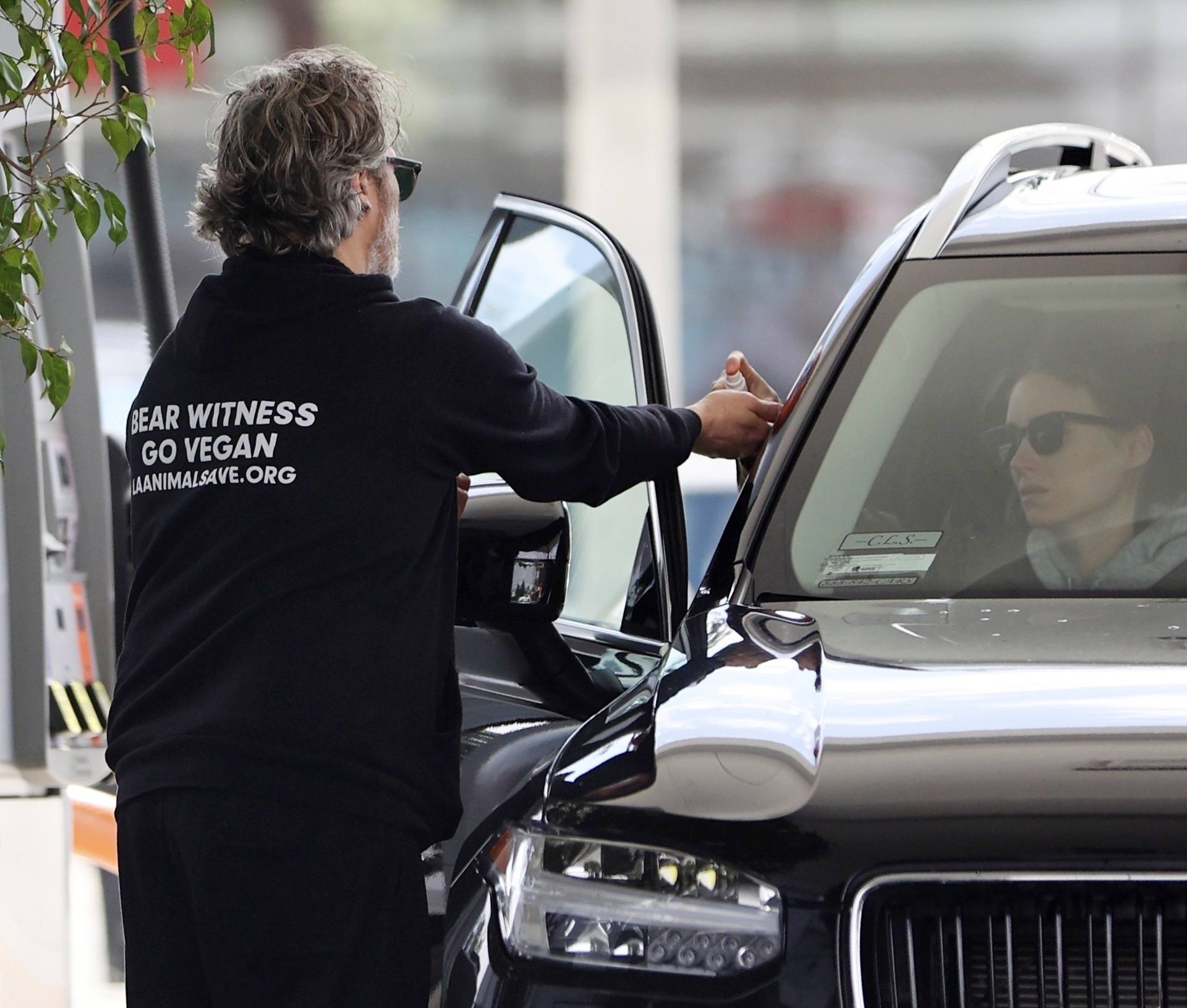 *EXCLUSIVE* Joaquin Phoenix and Rooney Mara are taking no risk with the coronavirus as they stop for gas