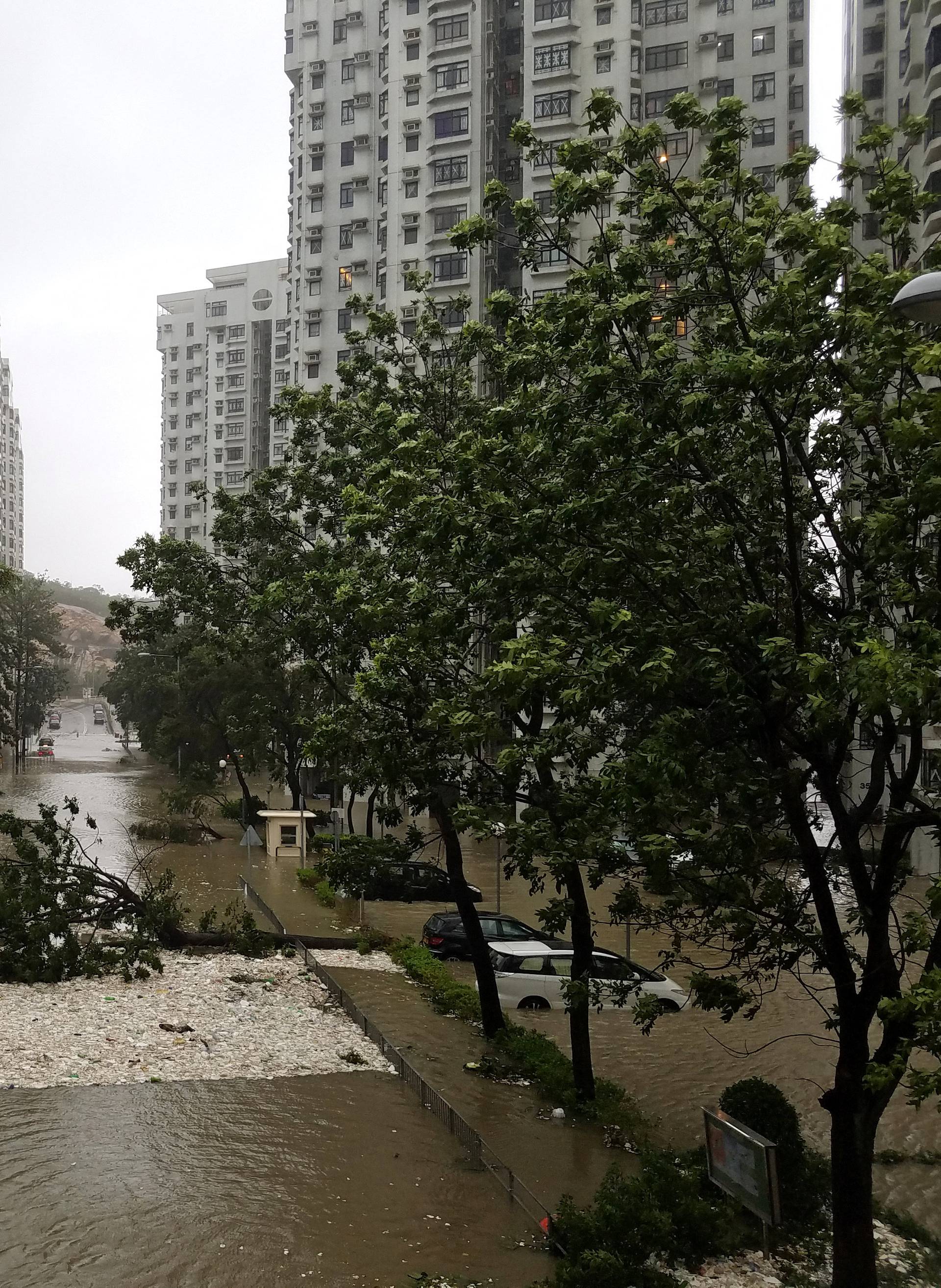 Foam brought by high waves is seen washed ashore in Heng Fa Chuen, a residential area near the waterfront, during Typhoon Mangkhut in Hong Kong