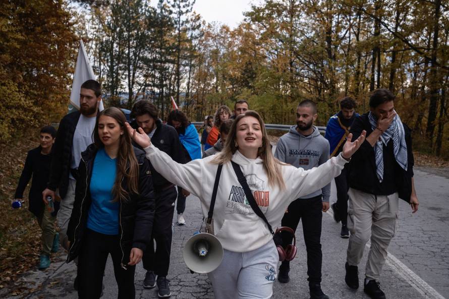 Students from Novi Pazar march to Divcibare as part of a journey leading up to a major protest in Novi Sad