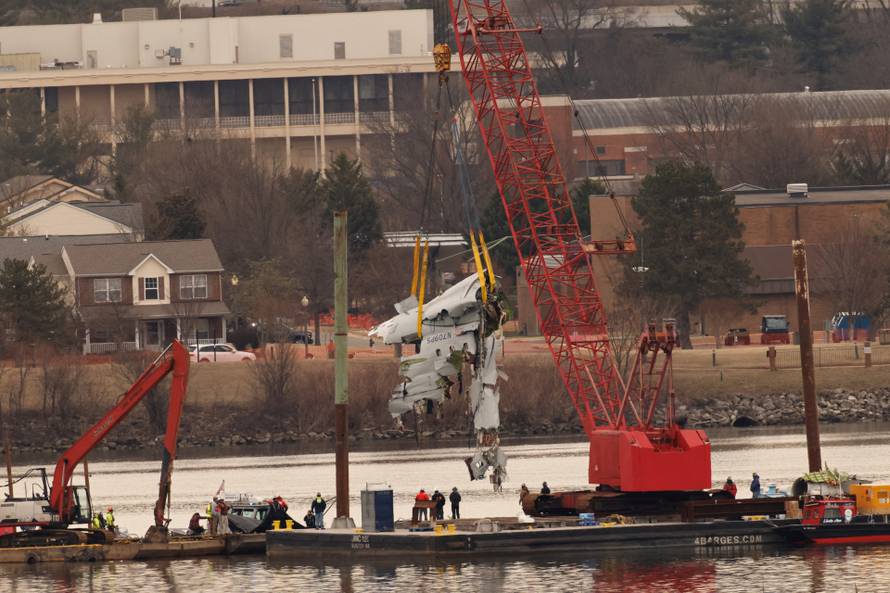 Aftermath of American Eagle flight 5342 crash in the Potomac River near Ronald Reagan Washington National Airport