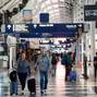 FILE PHOTO: Travelers walk through Chicago O'Hare International Airport