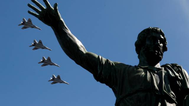 Russian jets fly in formation during the Victory Day parade at the Red Square in Moscow
