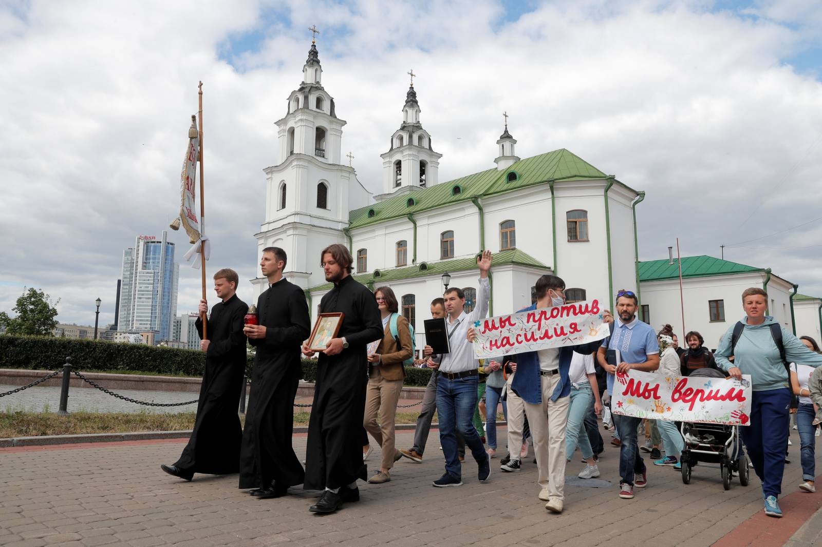 Believers take part in a religious procession against violence in Minsk