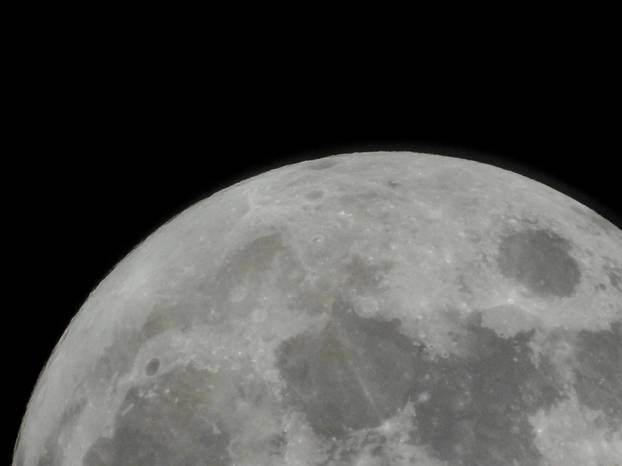 FILE PHOTO: The moon during its waxing gibbous phase over Ronda