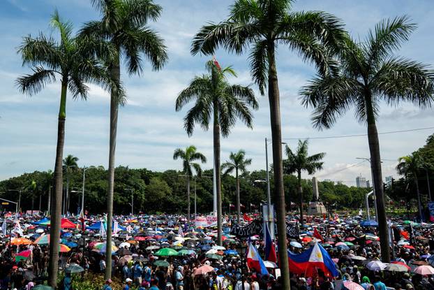 Filipinos gather during a protest denouncing what they call corruption linked to flood control projects