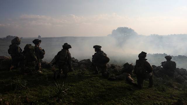 Israeli soldiers take part in a drill at the Israeli-occupied Golan Heights