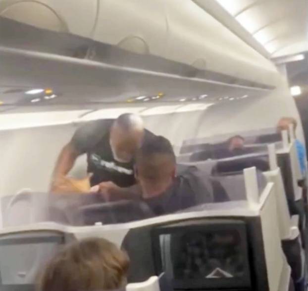 *PREMIUM-EXCLUSIVE* Former heavyweight boxing champion Mike Tyson Repeatedly Punches Man In Face On Plane, Bloodies Passenger!!