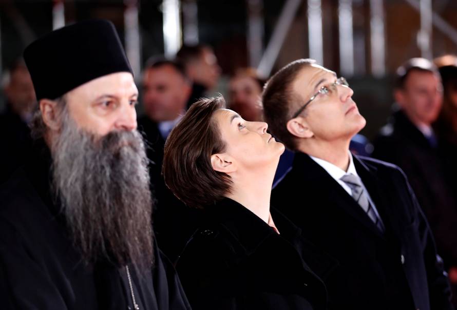 Serbian Prime Minister Ana Brnabic looks up during Russian President Vladimir Putin's St Sava temple visit in Belgrade