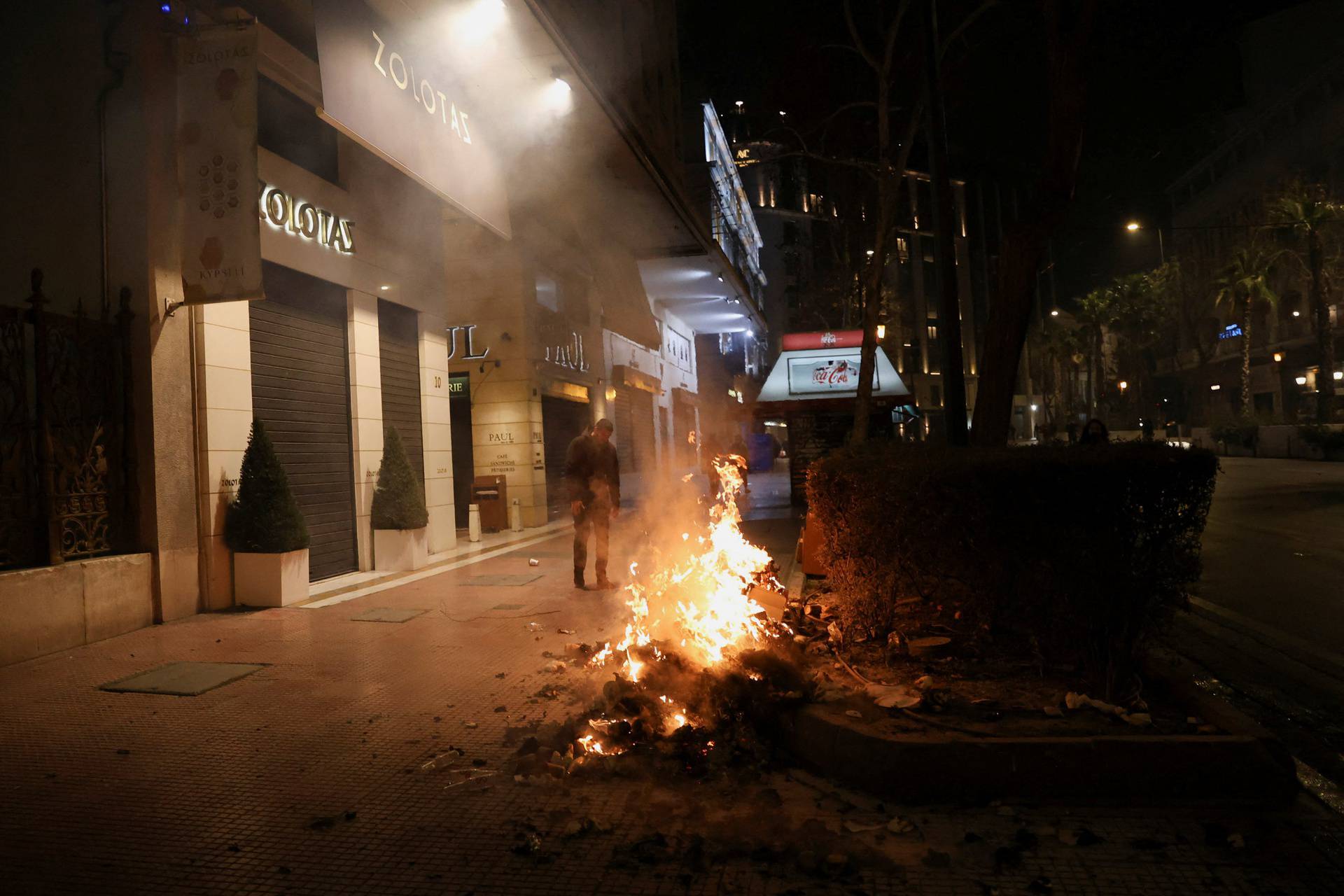 Protesters take part in a demonstration after a train crash near the city of Larissa, in Athens