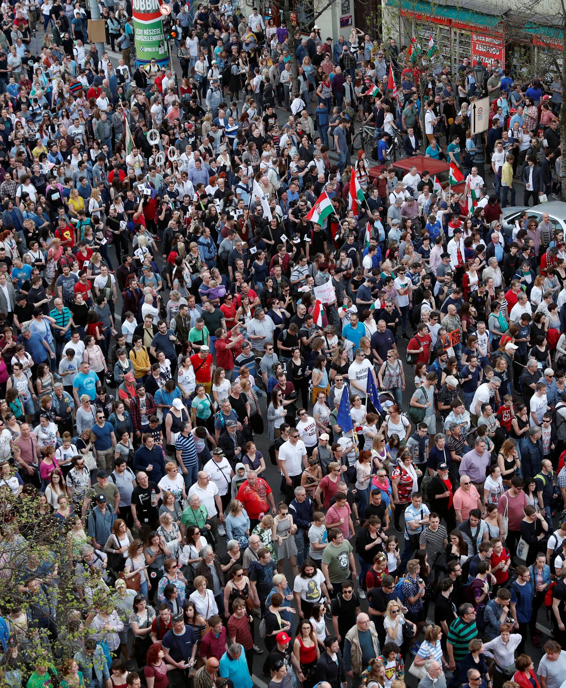 People attend a protest against the government of Prime Minister Viktor Orban in Budapest