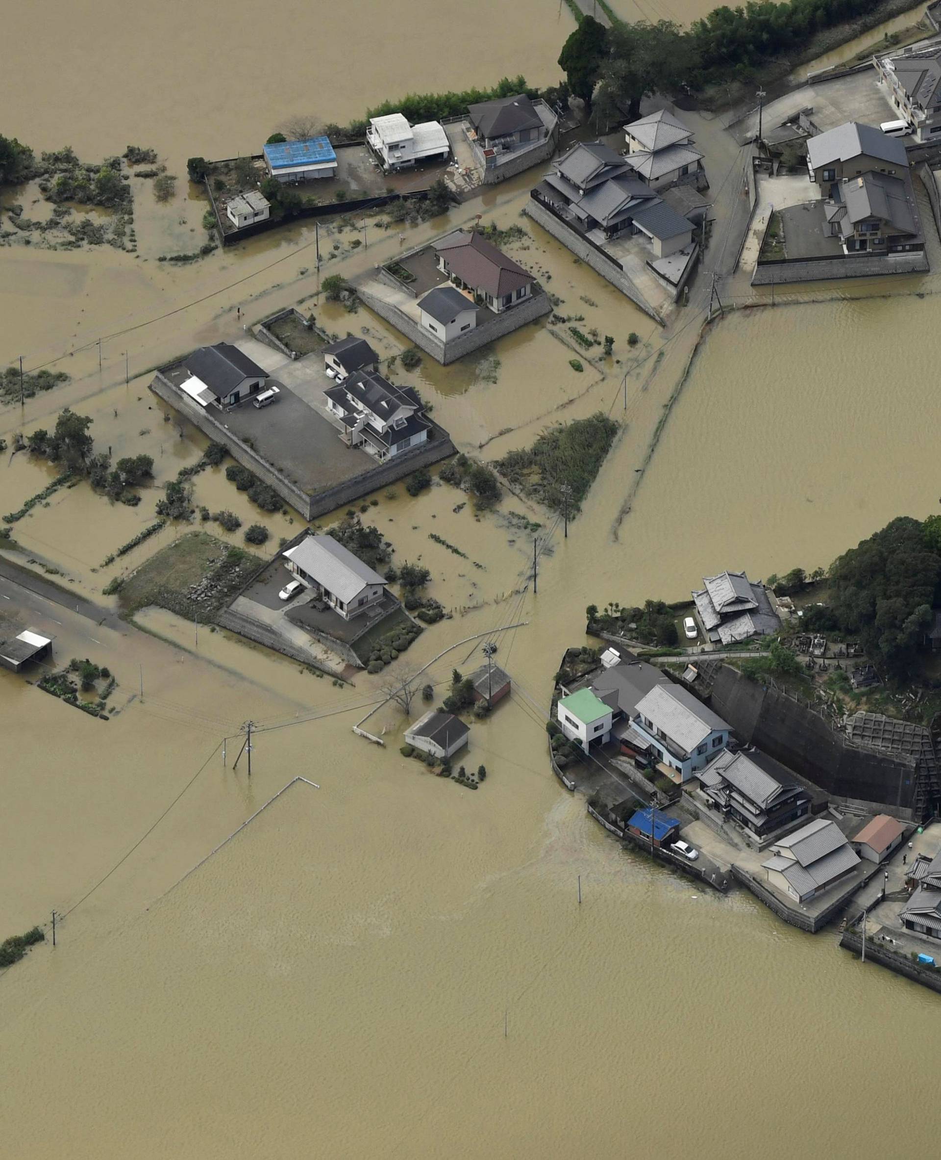 An aerial view shows flooded area due to heavy rains caused by Typhoon Malakas in Nobeoka, Miyazaki Prefecture, Japan