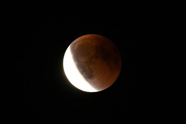 The full moon during a "Blood Moon" total lunar eclipse over Berlin