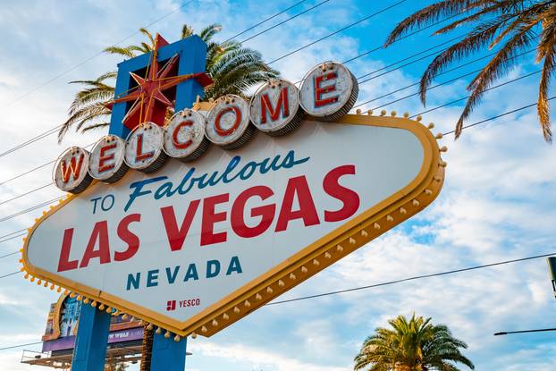 Entrance signboard of Las Vegas with cloudy sky in background