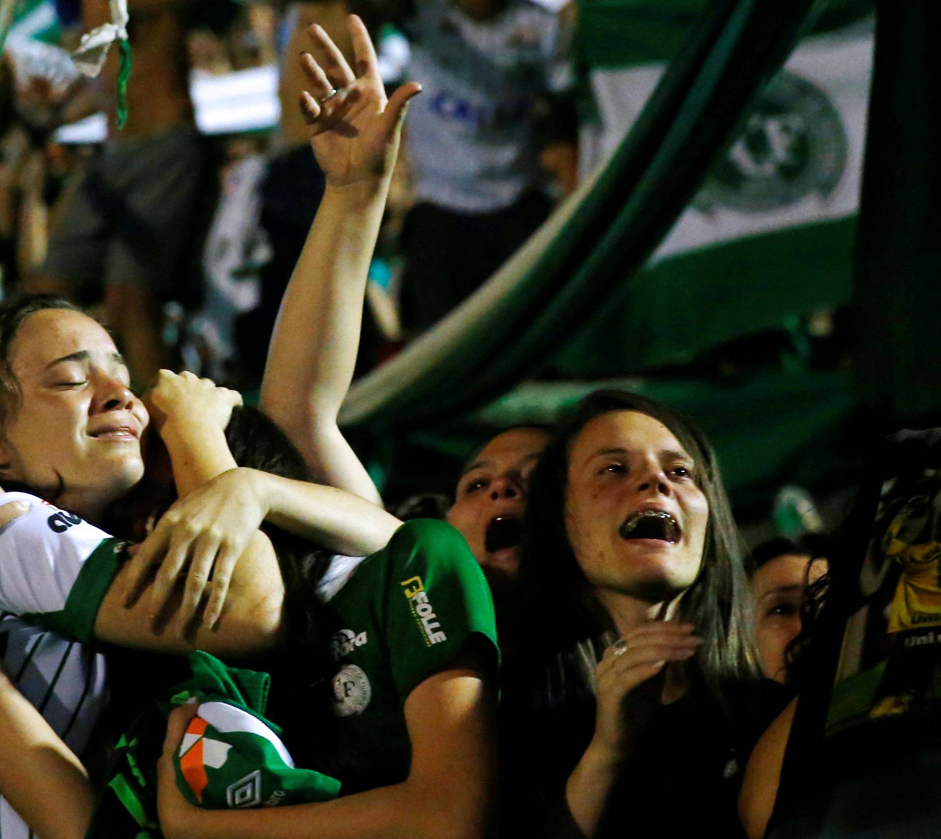 Fans of Chapecoense soccer team pay tribute to Chapecoense's players at the Arena Conda stadium in Chapeco