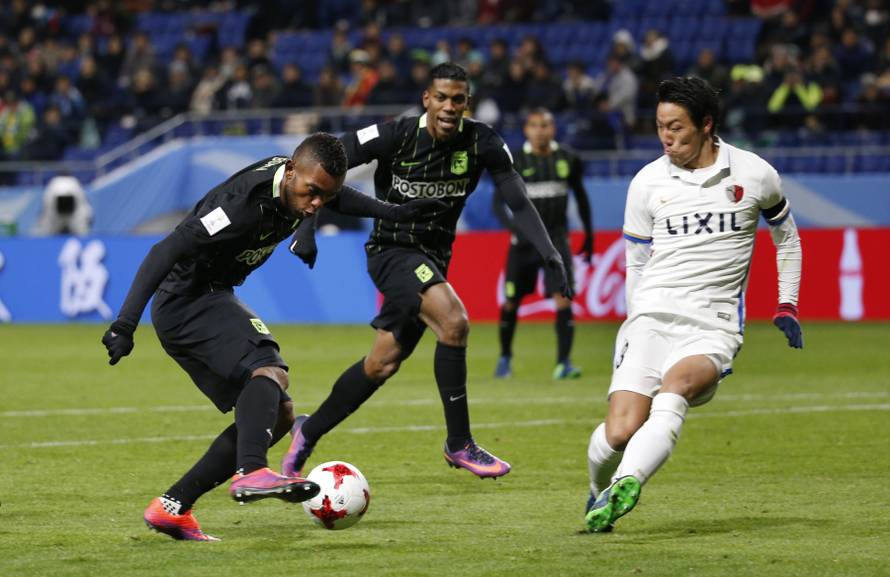 Atletico Nacional's Miguel Borja in action with Kashima Antlers' Gen Shoji