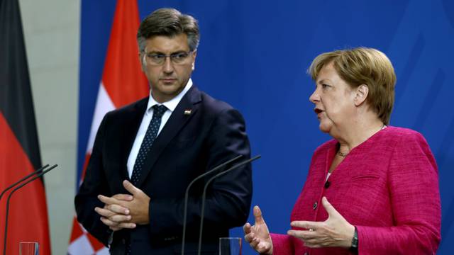 German Chancellor Merkel and Croatian Prime Minister Plenkovic addresss a news conference in Berlin