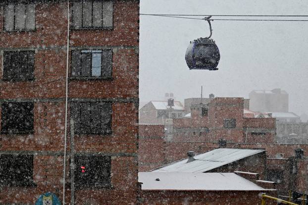 Snow falls amid low temperatures in Bolivia, in El Alto
