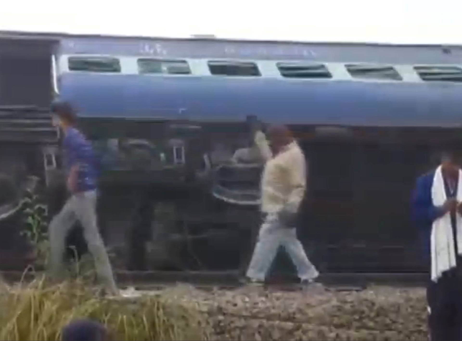 A view of a derailed train in Kanpur, in India's northern state of Uttar Pradesh