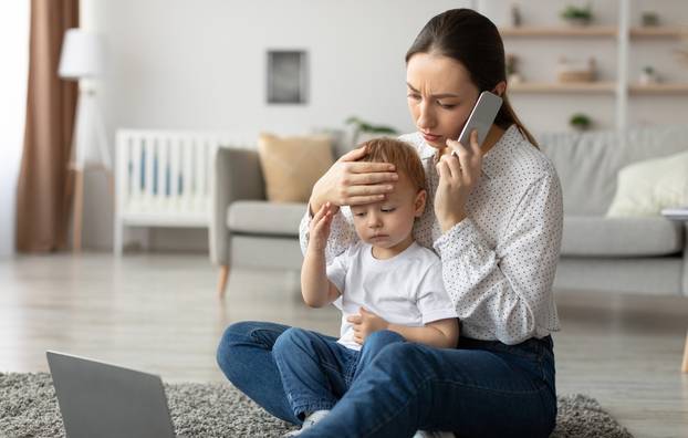 Call,To,Pediatrician.,Stressed,Mother,Talking,To,Doctor,,Worried,About