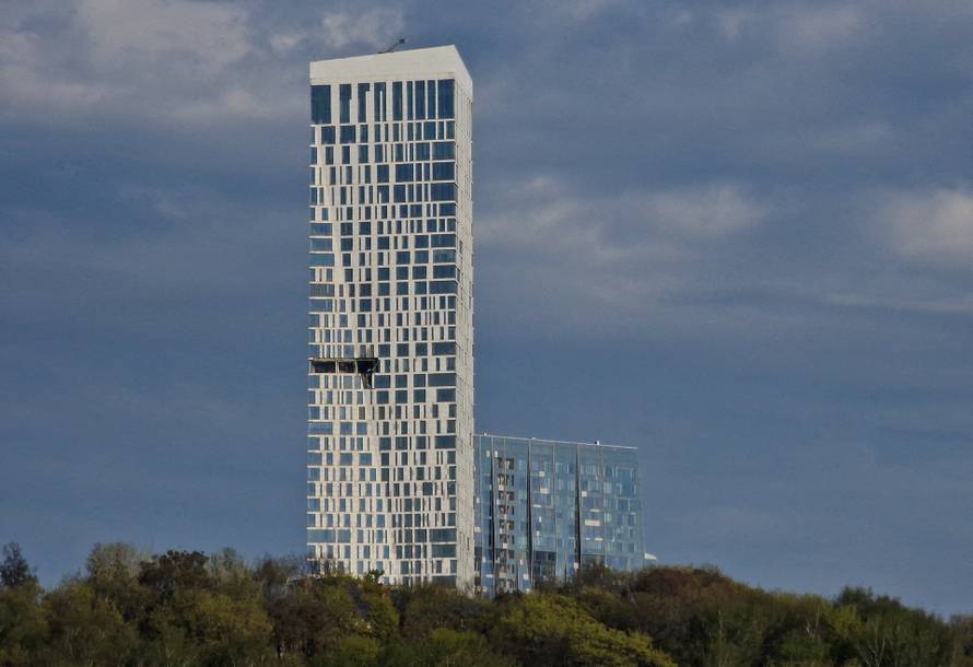 The damaged facade of a high-rise building following a drone attack, amid the Russia-Ukraine conflict, in Moscow