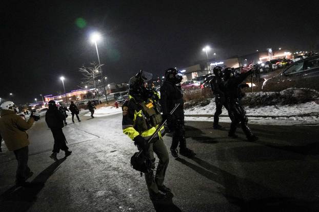 Protest outside the hotel where Bovino, who has been removed from his role, is reportedly staying, in Maple Grove