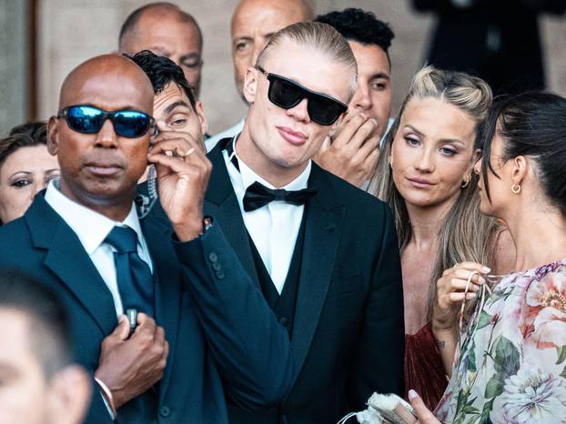 Locorotondo (Bari), Italy. 24 July 2026. Erling Haaland arrives at the wedding ceremony of Italy and Manchester City goalkeeper Gianluigi Donnarumma and Alessia Elefante at the Church of San Giorgio Martire in Locorotondo, southern Italy. Photo by Mattia 