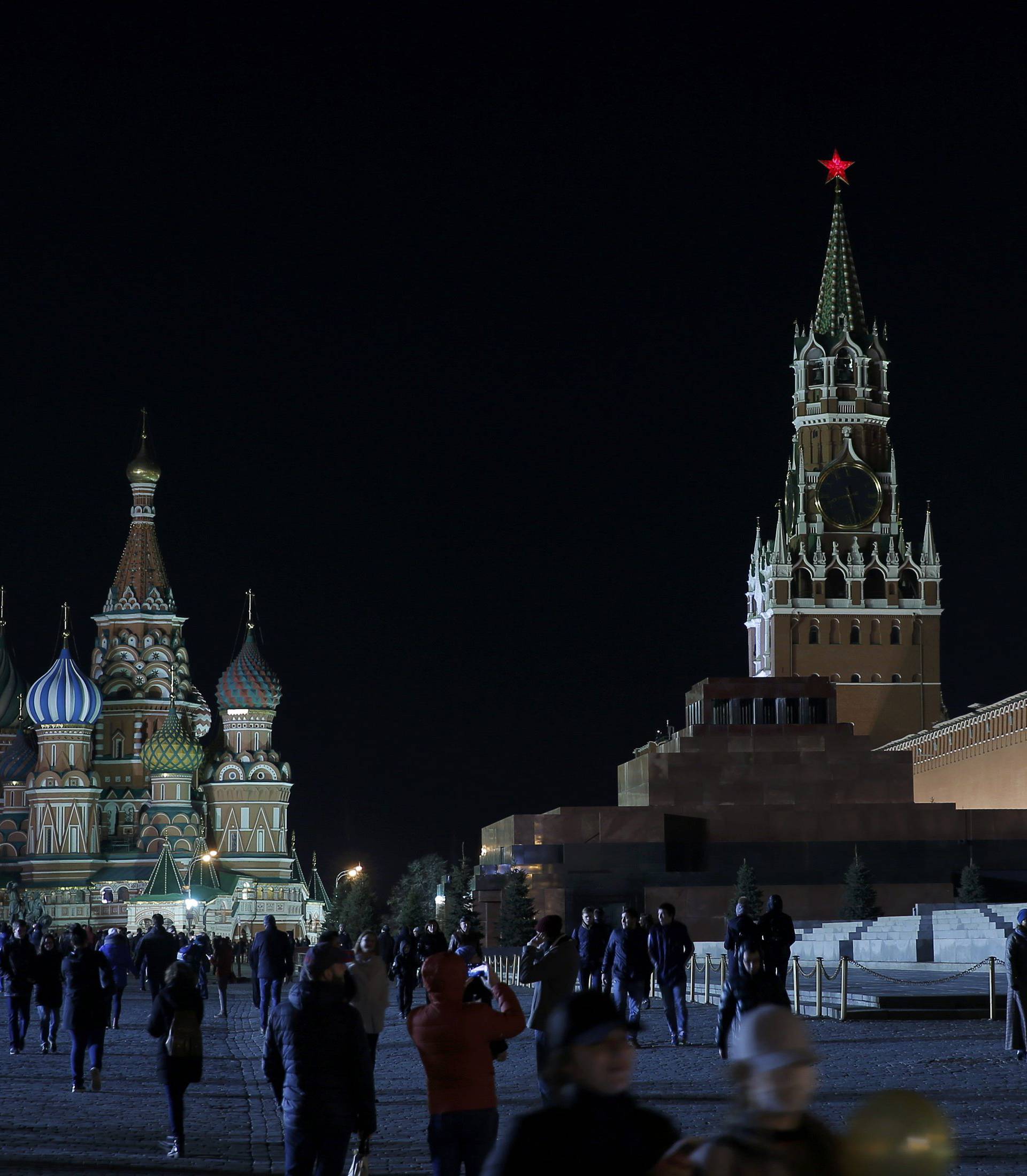 A view shows the St. Basil's Cathedral and the Kremlin wall before the lights were switched off for Earth Hour in Moscow