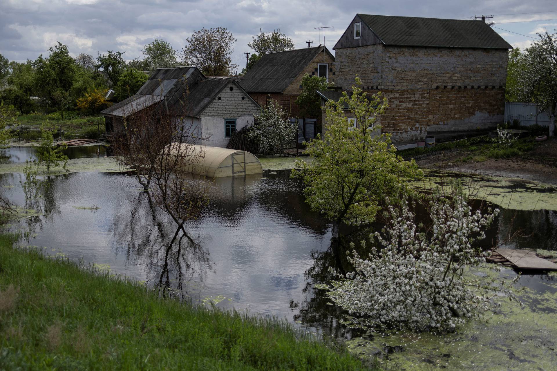 A house is seen flooded at an area after Ukrainian military forces opened a dam to flood an residencial area in order to stop advance of Russian forces to arrive to the capital city of Kyiv, in Demydiv, Ukraine