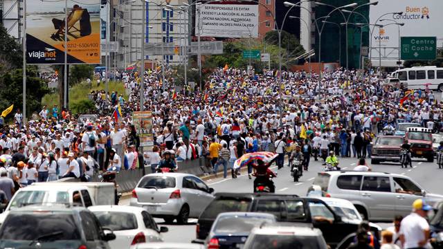 Opposition supporters take part in a rally to demand a referendum to remove Venezuela's President Nicolas Maduro, in Caracas, Venezuela