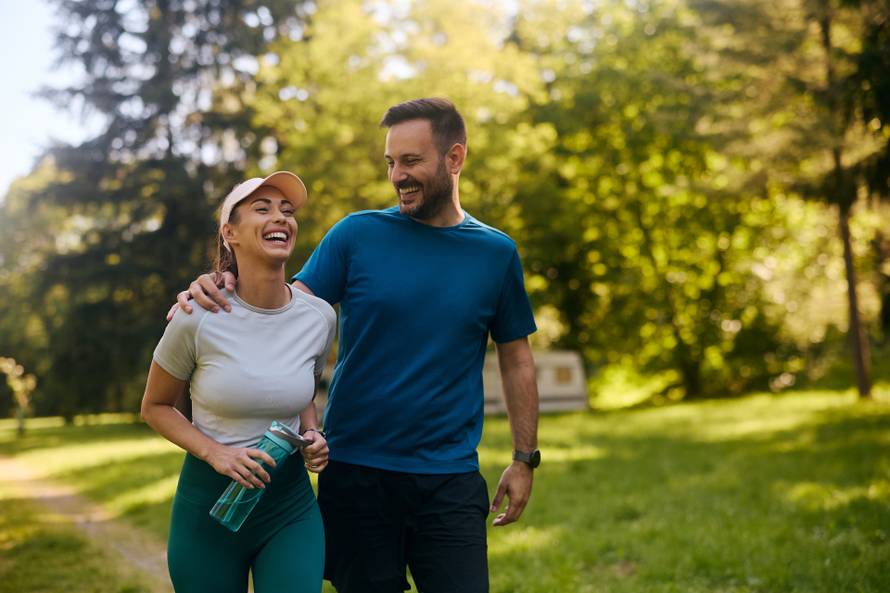 Cheerful,Couple,Having,Fun,While,Exercising,In,Nature.,Copy,Space.