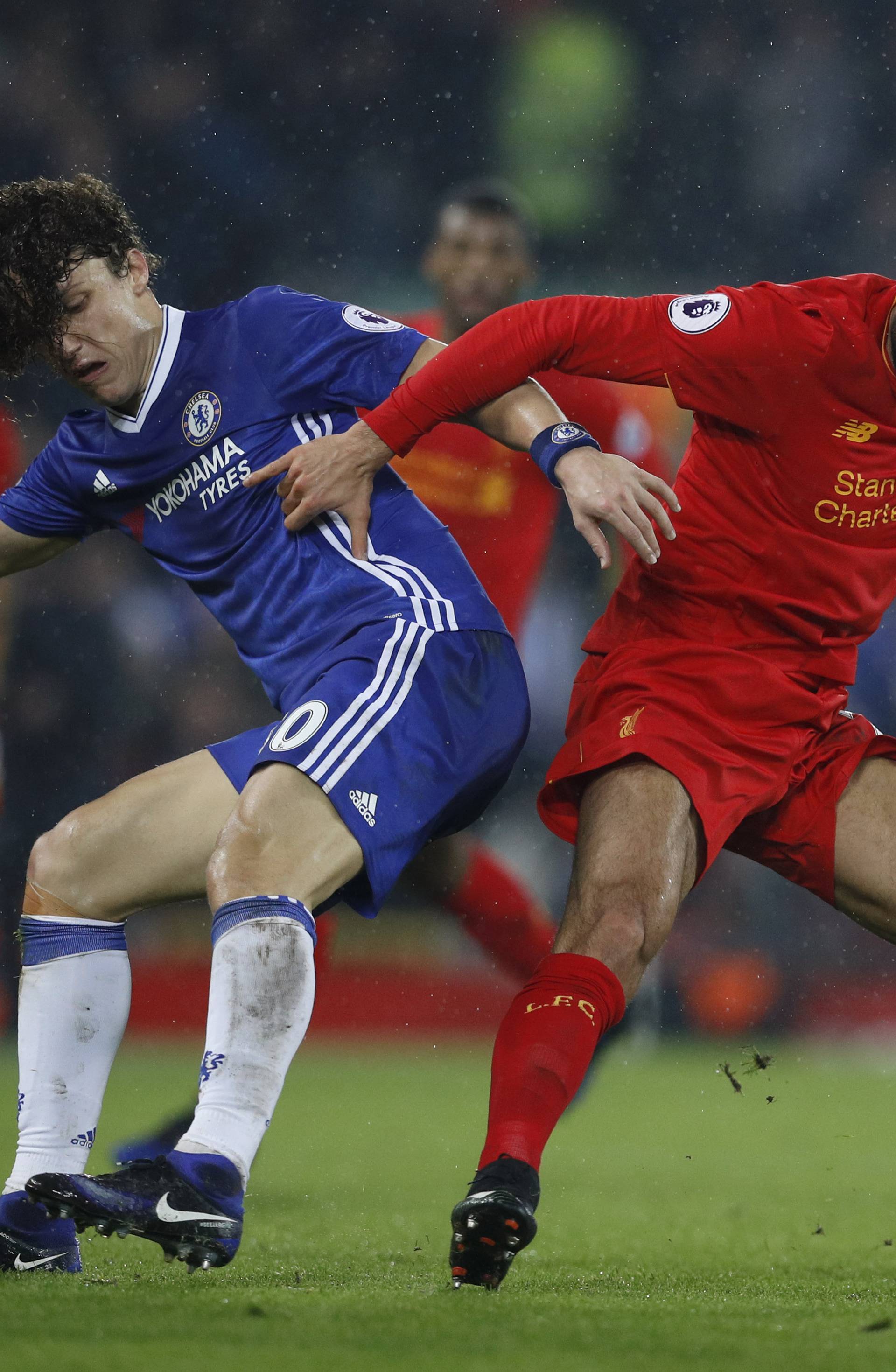 Chelsea's David Luiz in action with Liverpool's Emre Can