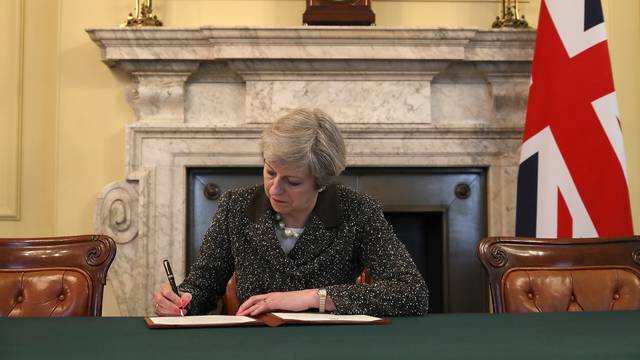 The Prime Minster Of the United Kingdom Theresa May Signs Article 50