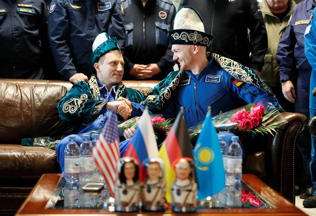 International Space Station crew members Gerst and Prokopyev attend a news conference in Zhezkazgan