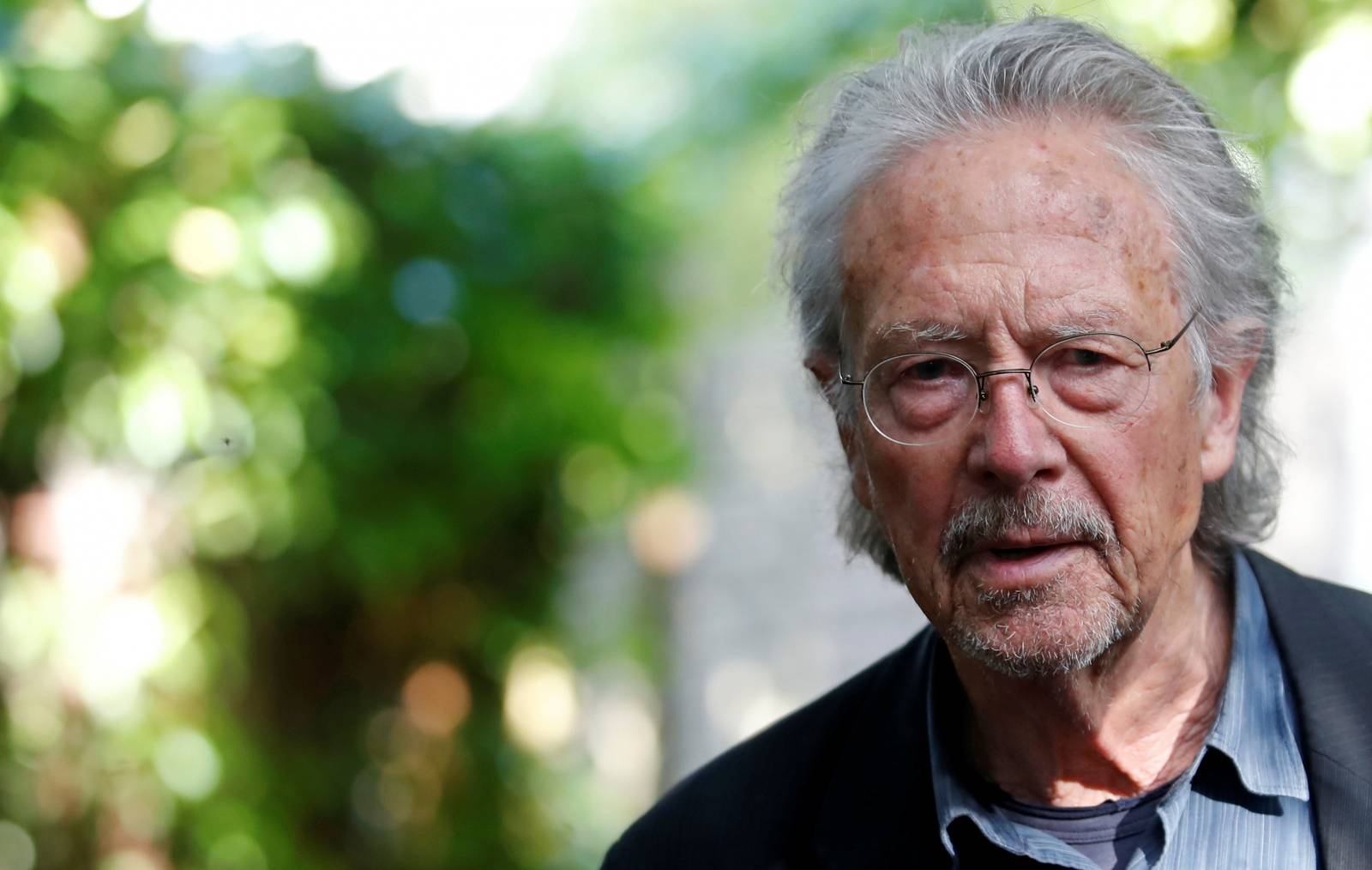 Austrian author Peter Handke, winner of the 2019 Nobel Prize in Literature, poses in his house in Chaville