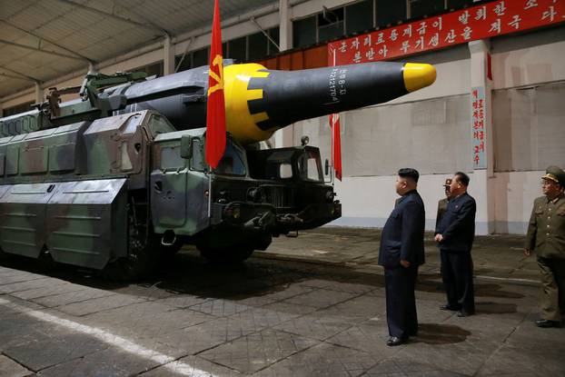 North Korean leader Kim Jong Un inspects the long-range strategic ballistic rocket Hwasong-12 (Mars-12)