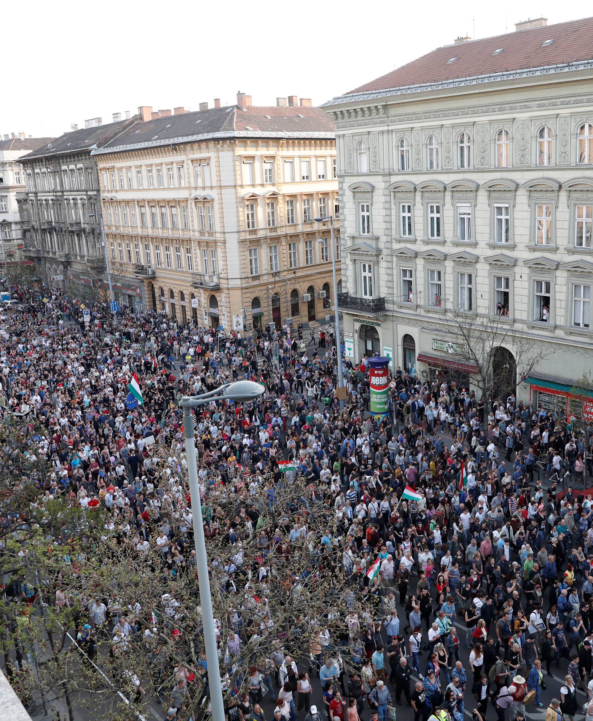 People attend a protest against the government of Prime Minister Viktor Orban in Budapest